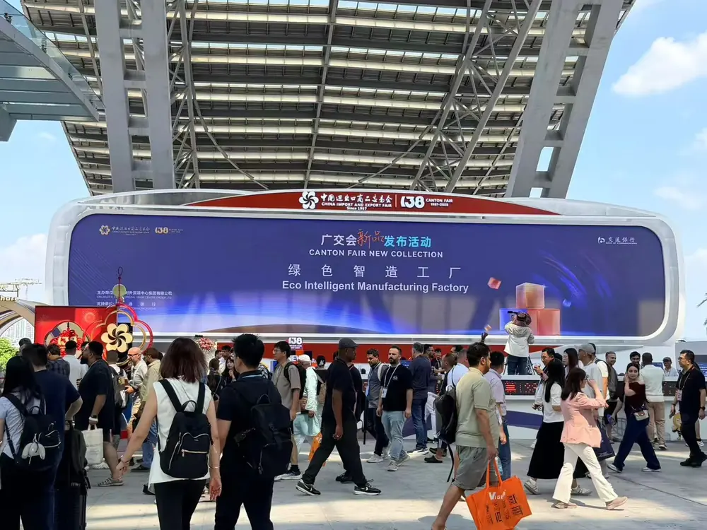 Crowds at the entrance sign of the 138th Canton Fair venue in 2025